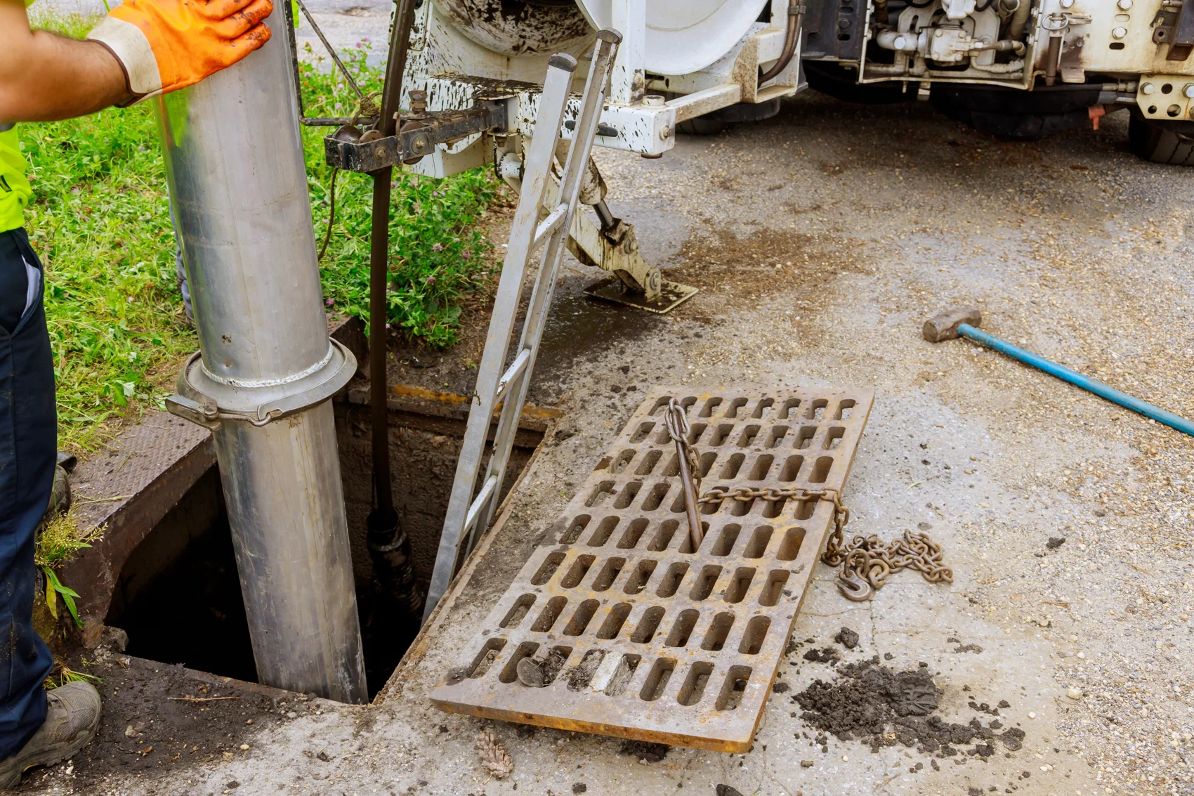 Industrial sewer cleaning truck on site for scheduled maintenance