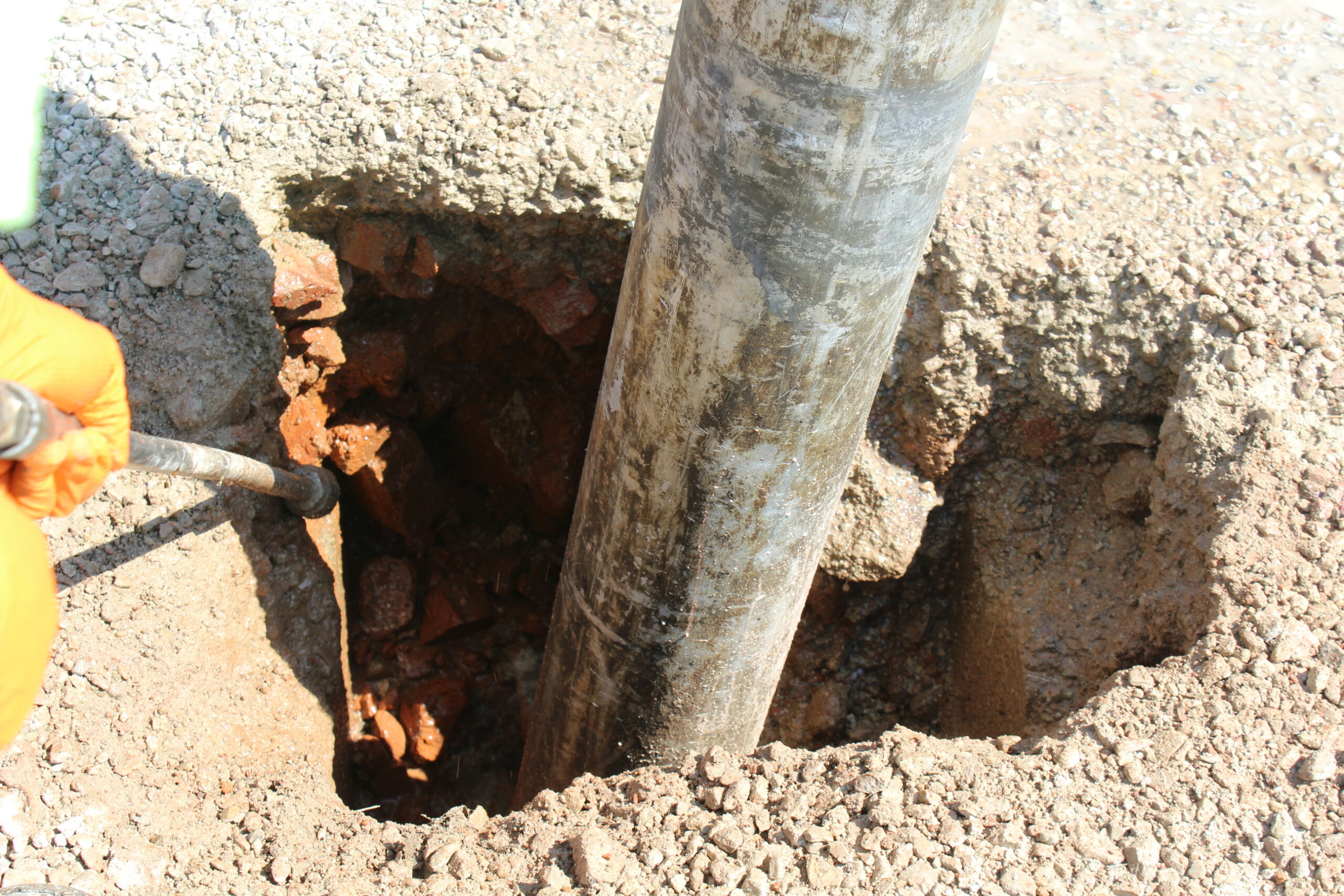 Construction worker on site during hydro excavation project