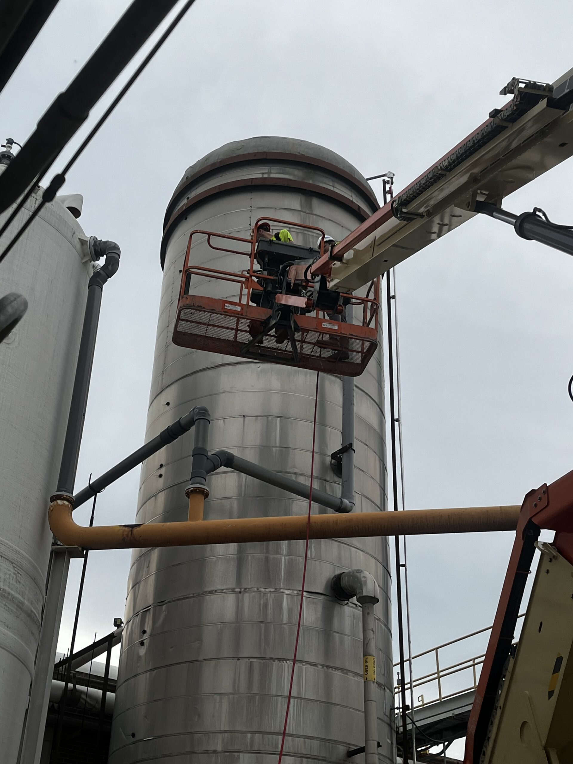 Worker in a confined or hard-to-reach industrial space